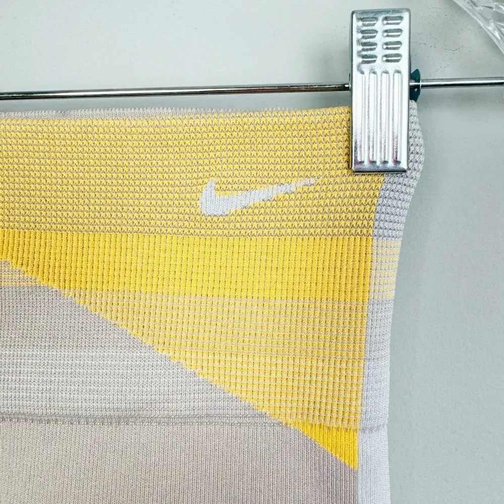 NIKE | Dri Fit Sculpt Icon Clash Cropped Leggings Yellow Gray Tan Women’s Size M